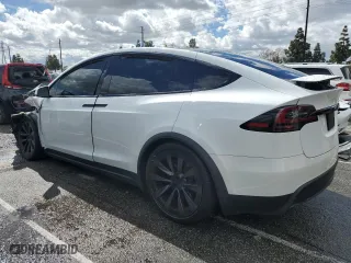 2023 Tesla Model X with VIN 7SAXCBE54PF405542, listed as a Copart auction lot 47893235 with 0 mi miles and Salvage Title. Bid and sale history available at carsss.com. Image 2.
