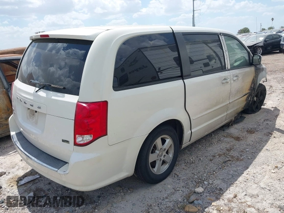 2013 Dodge Grand Caravan SXT with VIN 2C4RDGCG5DR524074, listed as a IAAI auction lot 37312051 with Not Provided miles and . Bid and sale history available at DreamBid. Image 4.