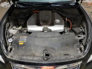 2012 Infiniti M Hybrid with VIN JN1EY1AP7CM910194, listed as a Copart auction lot 72003524 with 124,723 mi miles and Salvage title. Bid and sale history available at DreamBid. Image 11.