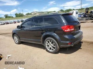 2013 Dodge Journey R/T with VIN 3C4PDDEGXDT597439, listed as a Copart auction lot 63650965 with 226,543 mi miles and Clean title. Bid and sale history available at DreamBid. Image 2.