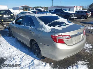 2014 Toyota Camry SE with VIN 4T1BK1FK6EU026342, listed as a IAAI auction lot 41246628 with 142,586 mi miles. Bid and sale history available at carsss.com. Image 3.