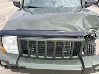 2006 Jeep Commander with VIN 1J8HG48K06C297654, listed as a Copart auction lot 51000155 with 126,235 mi miles and Salvage Title. Bid and sale history available at DreamBid. Image 14.