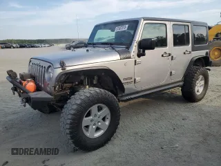2016 Jeep Wrangler Unlimited Sport с VIN 1C4BJWDG2GL185774, выставлен на аукционе Copart как лот 57407015 с пробегом 124 568 миль миль и Чистый • Clean title. История ставок и продаж доступна на DreamBid. Изображение 1.
