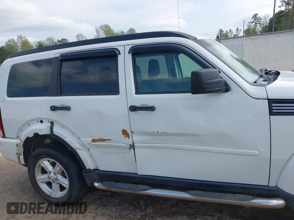 2008 Dodge Nitro SXT with VIN 1D8GU28K18W129119, listed as a IAAI auction lot 41899314 with 244,830 mi miles. Bid and sale history available at carsss.com. Image 6.