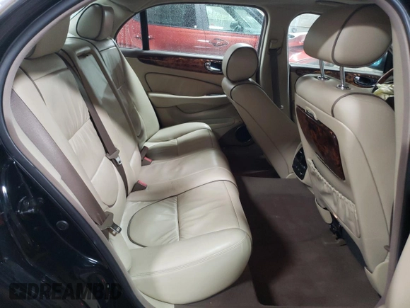 2005 Jaguar XJ Vanden Plas z VIN SAJWA82C65SG44373, wystawiony jako Copart lot #84091444 z przebiegiem 141 993 mil mil oraz Szkoda całkowita • Salvage title. Historia ofert i sprzedaży dostępna na DreamBid. Obrazek 10.