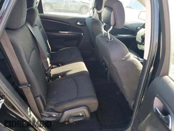 2015 Dodge Journey American Value with VIN 3C4PDCAB9FT692632, listed as a Copart auction lot 55261175 with 139,874 mi miles and Salvage Title. Bid and sale history available at DreamBid. Image 11.