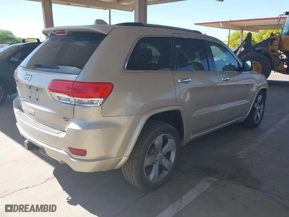 2014 Jeep Grand Cherokee Overland with VIN 1C4RJFCT4EC400565, listed as a IAAI auction lot 41937436 with 56,481 mi miles. Bid and sale history available at carsss.com. Image 4.