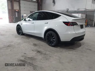 2020 Tesla Model Y Long Range z VIN 5YJYGDEE5LF041935, wystawiony jako IAAI lot #42369750 z przebiegiem 79 540 mil mil oraz . Historia ofert i sprzedaży dostępna na DreamBid. Obrazek 3.