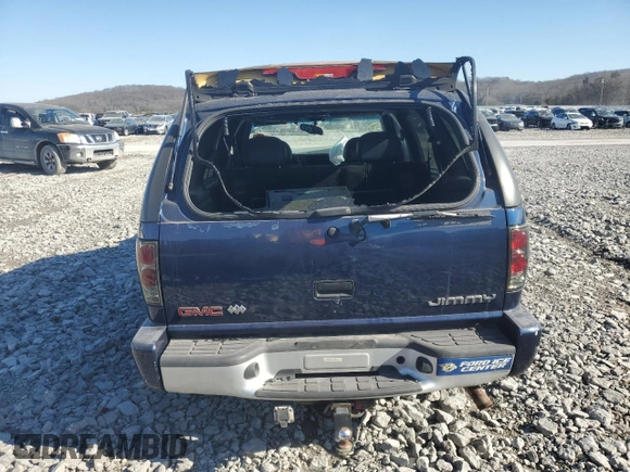 2000 GMC Jimmy Diamond Edition Luxury z VIN 1GKDT13W9Y2305564, wystawiony jako Copart lot #49488665 z przebiegiem 256 410 mil mil oraz Szkoda całkowita • Salvage title. Historia ofert i sprzedaży dostępna na DreamBid. Obrazek 6.