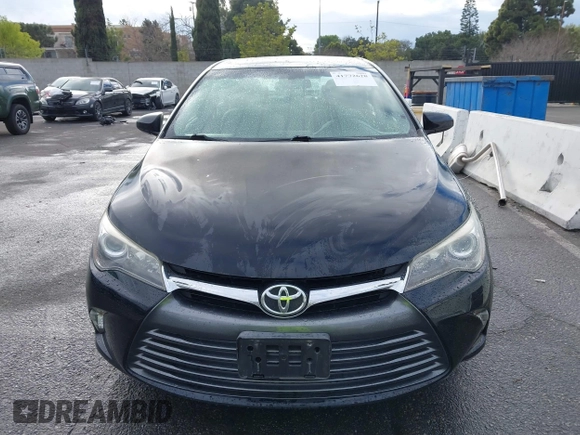 2015 Toyota Camry XLE with VIN 4T4BF1FK9FR461402, listed as a IAAI auction lot 41772628 with 92,795 mi miles and . Bid and sale history available at DreamBid. Image 12.