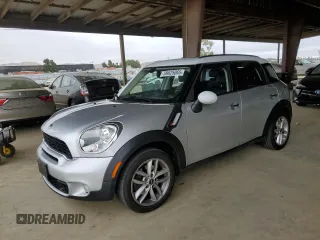 2011 MINI Countryman S with VIN WMWZC3C56BWL80868, listed as a Copart auction lot 59625065 with 111,460 mi miles and Salvage title. Bid and sale history available at DreamBid. Image 1.