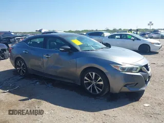 2016 Nissan Maxima SL with VIN 1N4AA6AP5GC406743, listed as a IAAI auction lot 41976960 with 105,106 mi miles and . Bid and sale history available at DreamBid. Image 1.