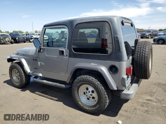 2002 Jeep Wrangler X with VIN 1J4FA39S32P708163, listed as a Copart auction lot 69703254 with 119,843 mi miles and Salvage Title. Bid and sale history available at carsss.com. Image 2.