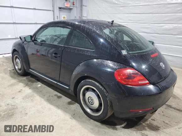 2012 Volkswagen Beetle 2.5L w/Sound/Nav PZEV with VIN 3VWJP7AT5CM637224, listed as a Copart auction lot 49949995 with 203,326 mi miles and Salvage Title. Bid and sale history available at DreamBid. Image 2.