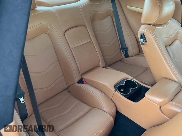 2012 Maserati GranTurismo S z VIN ZAM45KLA1C0061862, wystawiony jako Copart lot #87091844 z przebiegiem 31 825 mil mil oraz Czysty tytuł • Clean title. Historia ofert i sprzedaży dostępna na DreamBid. Obrazek 6.