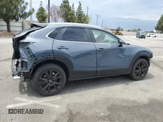 2023 Mazda CX-30 S Carbon Edition with VIN 3MVDMBCM5PM560912, listed as a Copart auction lot 59174445 with 5,247 mi miles and Salvage title. Bid and sale history available at DreamBid. Image 3.