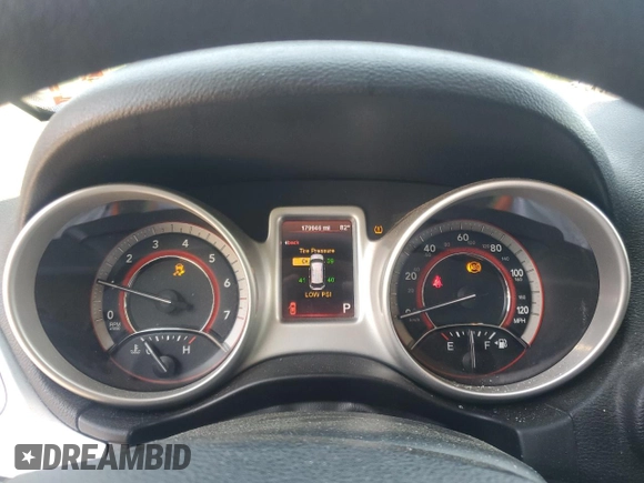 2012 Dodge Journey SXT with VIN 3C4PDCBB6CT324709, listed as a Copart auction lot 63300405 with 179,946 mi miles and Salvage title. Bid and sale history available at DreamBid. Image 9.