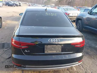 2019 Audi A4 Premium z VIN WAUGMAF41KN004404, wystawiony jako IAAI lot #41649137 z przebiegiem 68 076 mil mil oraz . Historia ofert i sprzedaży dostępna na DreamBid. Obrazek 16.