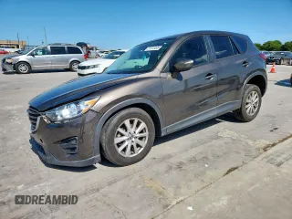 2016 Mazda CX-5 Sport with VIN JM3KE2BY3G0910896, listed as a Copart auction lot 61816495 with 156,646 mi miles and Salvage title. Bid and sale history available at DreamBid. Image 1.