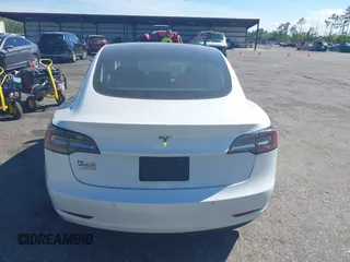 2019 Tesla Model 3 Mid Range with VIN 5YJ3E1EA7KF425127, listed as a IAAI auction lot 41886436 with 87,236 mi miles and . Bid and sale history available at carsss.com. Image 16.