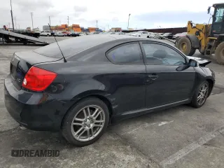 2007 Scion tC Spec z VIN JTKDE167670203703, wystawiony jako Copart lot #56007245 z przebiegiem Nie podano mil oraz Szkoda całkowita • Salvage title. Historia ofert i sprzedaży dostępna na DreamBid. Obrazek 3.