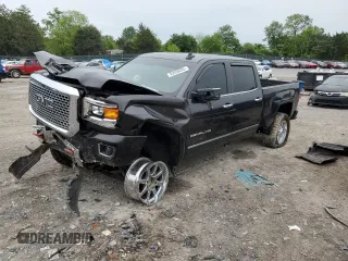 2016 GMC Sierra 2500HD Denali z VIN 1GT12UE84GF172804, wystawiony jako Copart lot #55956095 z przebiegiem 147 621 mil mil oraz Szkoda całkowita • Salvage title. Historia ofert i sprzedaży dostępna na DreamBid. Obrazek 1.