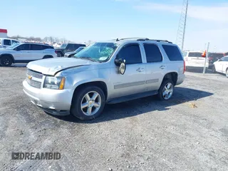 2013 Chevrolet Tahoe LT z VIN 1GNSCBE06DR106384, wystawiony jako IAAI lot #41574274 z przebiegiem 168 655 mil mil oraz . Historia ofert i sprzedaży dostępna na DreamBid. Obrazek 2.