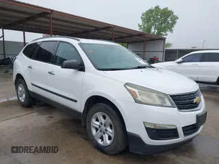 2016 Chevrolet Traverse LS z VIN 1GNKRFKDXGJ237589, wystawiony jako IAAI lot #42145797 z przebiegiem 215 694 mil mil oraz . Historia ofert i sprzedaży dostępna na DreamBid. Obrazek 1.