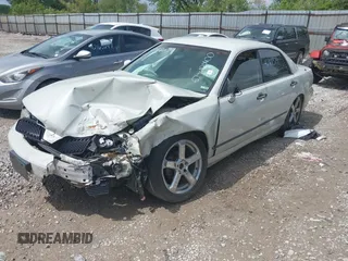 2002 Mitsubishi Diamante LS z VIN 6MMAP57P72T008216, wystawiony jako IAAI lot #42168379 z przebiegiem 154 285 mil mil oraz . Historia ofert i sprzedaży dostępna na DreamBid. Obrazek 2.
