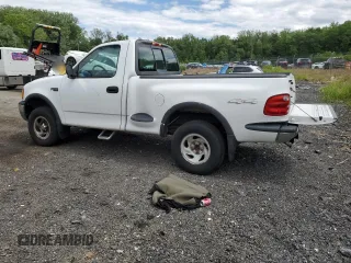 2004 Ford F-150 with VIN 2FTRF08294CA16417, listed as a Copart auction lot 58192935 with 233,414 mi miles and Salvage title. Bid and sale history available at DreamBid. Image 2.