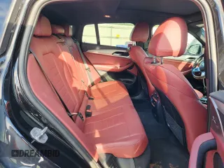 2021 BMW X4 M40i with VIN 5UX2V5C05M9F68427, listed as a Copart auction lot 64941095 with 50,208 mi miles and Salvage title. Bid and sale history available at DreamBid. Image 10.