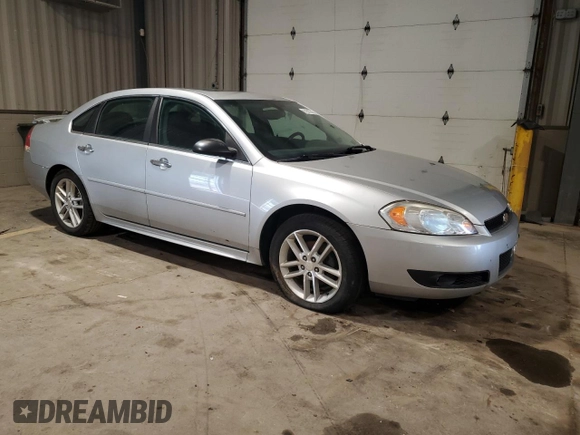 2014 Chevrolet Impala LTZ with VIN 2G1WC5E36E1133688, listed as a Copart auction lot 61903325 with 87,636 mi miles and Clean title. Bid and sale history available at DreamBid. Image 4.