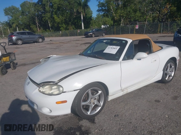 2003 Mazda MX-5 Miata Cloth z VIN JM1NB353730312566, wystawiony jako IAAI lot #41782864 z przebiegiem Nie podano mil oraz . Historia ofert i sprzedaży dostępna na DreamBid. Obrazek 18.