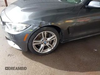 2015 BMW 4 Series 435i with VIN WBA3R1C59FK194649, listed as a IAAI auction lot 41565414 with 123,702 mi miles and . Bid and sale history available at DreamBid. Image 6.