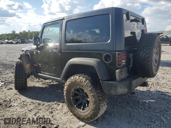 2010 Jeep Wrangler Rubicon with VIN 1J4BA6D10AL109001, listed as a Copart auction lot 69453954 with 137,821 mi miles and Salvage title. Bid and sale history available at DreamBid. Image 2.