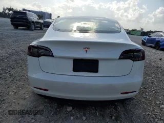 2023 Tesla Model 3 z VIN 5YJ3E1EAXPF422956, wystawiony jako Copart lot #52500285 z przebiegiem 24 082 mil mil oraz Nie do naprawy • Non repairable. Historia ofert i sprzedaży dostępna na DreamBid. Obrazek 6.