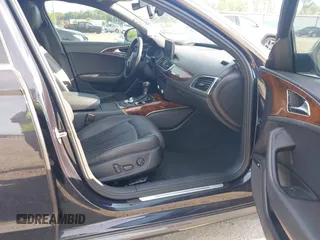 2015 Audi A6 3.0T Prestige with VIN WAUHGAFC3FN011654, listed as a IAAI auction lot 42104153 with 166,719 mi miles. Bid and sale history available at carsss.com. Image 5.