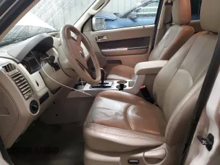 2009 Mercury Mariner Premier with VIN 4M2CU97749KJ15561, listed as a Copart auction lot 86042054 with 153,073 mi miles and Salvage Title. Bid and sale history available at carsss.com. Image 7.