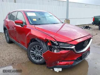 2021 Mazda CX-5 Touring with VIN JM3KFACM4M0382834, listed as a IAAI auction lot 41716817 with 28,894 mi miles. Bid and sale history available at carsss.com. Image 6.