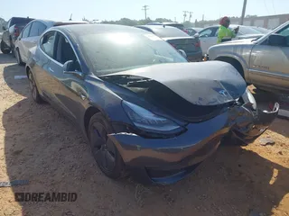 2019 Tesla Model 3 Long Range with VIN 5YJ3E1EB2KF510398, listed as a IAAI auction lot 42067654 with 108,971 mi miles and . Bid and sale history available at carsss.com. Image 1.