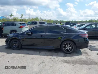 2023 Toyota Camry SE with VIN 4T1G11AK6PU741172, listed as a IAAI auction lot 41599909 with 56,668 mi miles and . Bid and sale history available at DreamBid. Image 14.