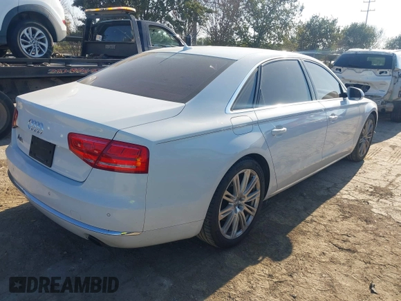 2014 Audi A8 3.0T z VIN WAURGAFDXEN006902, wystawiony jako IAAI lot #41099662 z przebiegiem 118 734 mil mil oraz . Historia ofert i sprzedaży dostępna na DreamBid. Obrazek 4.