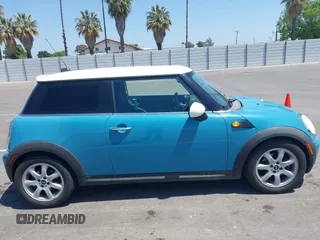 2007 MINI Hardtop with VIN WMWMF335X7TT54929, listed as a IAAI auction lot 42173757 with 71,496 mi miles and . Bid and sale history available at DreamBid. Image 14.