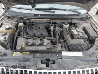 2005 Mercury Montego Luxury z VIN 1MEFM40185G611793, wystawiony jako IAAI lot #41125667 z przebiegiem Nie podano mil oraz . Historia ofert i sprzedaży dostępna na DreamBid. Obrazek 10.