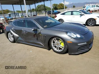 2014 Porsche Panamera S E-Hybrid z VIN WP0AD2A78EL044818, wystawiony jako Copart lot #65864484 z przebiegiem 141 423 mil mil oraz Szkoda całkowita • Salvage title. Historia ofert i sprzedaży dostępna na DreamBid. Obrazek 4.