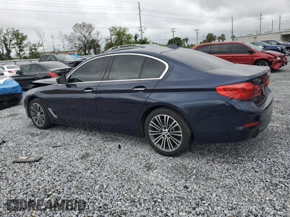 2017 BMW 5 Series 530i xDrive with VIN WBAJA7C3XHWA70310, listed as a Copart auction lot 52139025 with 56,498 mi miles and Clean Title. Bid and sale history available at carsss.com. Image 2.