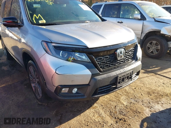 2021 Honda Passport EX-L with VIN 5FNYF8H54MB042677, listed as a IAAI auction lot 40732860 with 63,698 mi miles and . Bid and sale history available at DreamBid. Image 6.