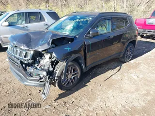 2018 Jeep Compass Latitude with VIN 3C4NJDBBXJT458268, listed as a IAAI auction lot 40965832 with 86,553 mi miles and . Bid and sale history available at DreamBid. Image 2.