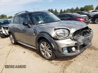 2017 MINI Countryman Cooper S with VIN WMZYT5C33H3D81529, listed as a Copart auction lot 66308674 with 96,091 mi miles and Salvage Title. Bid and sale history available at carsss.com. Image 4.