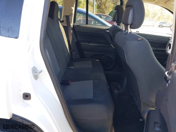 2016 Jeep Compass Sport with VIN 1C4NJDBB0GD617720, listed as a IAAI auction lot 41854195 with 97,961 mi miles. Bid and sale history available at carsss.com. Image 8.